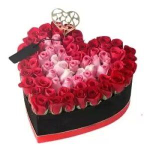 70 stems of roses in a heart box