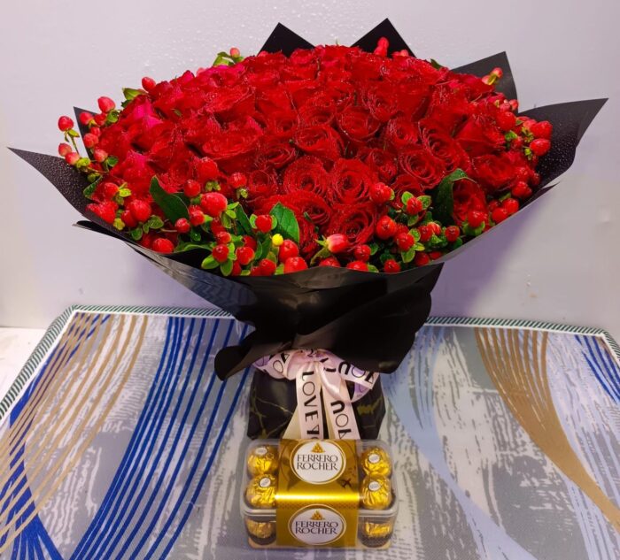 Bouquet of red roses and ferrero chocolates